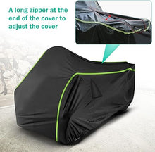 Load image into Gallery viewer, Black motorcycle cover with green zipper on a blurred background