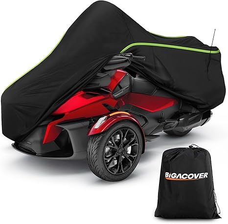 Red three-wheeled vehicle with a black cover and a Bigacover bag on a white background