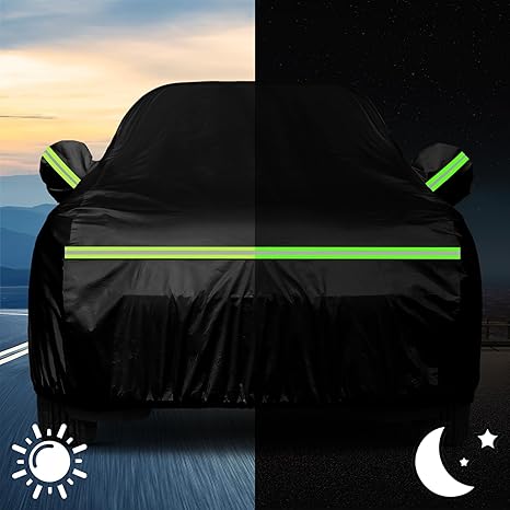 Black car cover with reflective stripes on a mountain landscape background