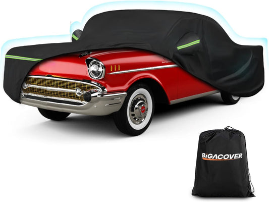 Black car cover on a red classic car with a Bigcover bag displayed below.