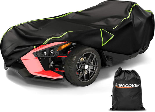 Black motorcycle cover with green accents on a red motorcycle, accompanied by a Bigacover branded bag.