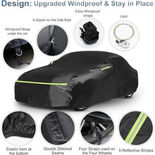 Load image into Gallery viewer, Black motorcycle cover with windproof features and design elements on a white background
