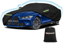 Load image into Gallery viewer, Blue car partially covered by a black car cover with a Bigacover bag on a white background
