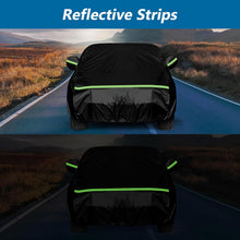 Load image into Gallery viewer, Car covered with a black reflective strip on a road with mountains in the background
