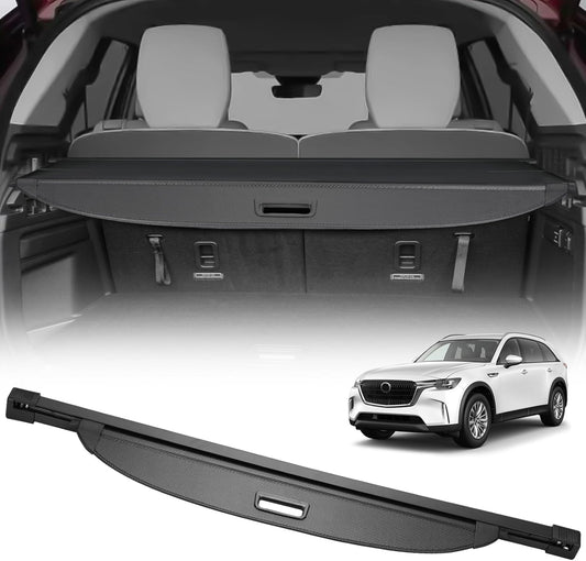 Car trunk with open cargo cover and a white SUV in the background