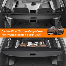 Load image into Gallery viewer, Carbon fiber texture cargo cover for Hyundai Santa Fe 2024-2025 shown in an open car trunk.
