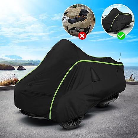 Motorcycle covered with a black cover on a scenic background