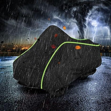 Load image into Gallery viewer, Motorcycle covered with a rain cover during a stormy night.
