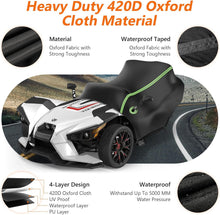 Load image into Gallery viewer, Motorcycle with a black cover on a road, highlighting Oxford cloth material and waterproof features.
