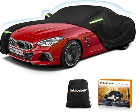 Red car with a black car cover, Big Cover packaging, and carrying bag on a white background