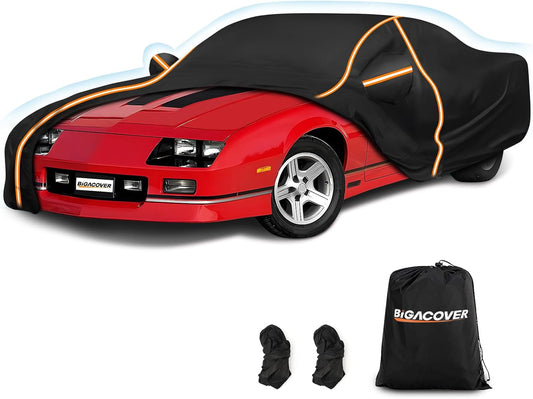 Red car with a black car cover, gloves, and a Bigacover bag on a white background