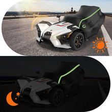 Load image into Gallery viewer, Two views of a futuristic vehicle on a road with sun and moon icons.
